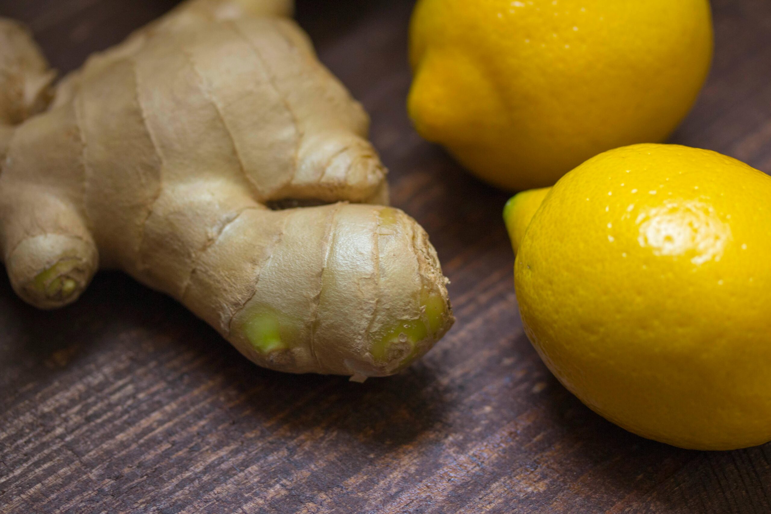 Fresh ginger and lemons showcasing natural ingredients