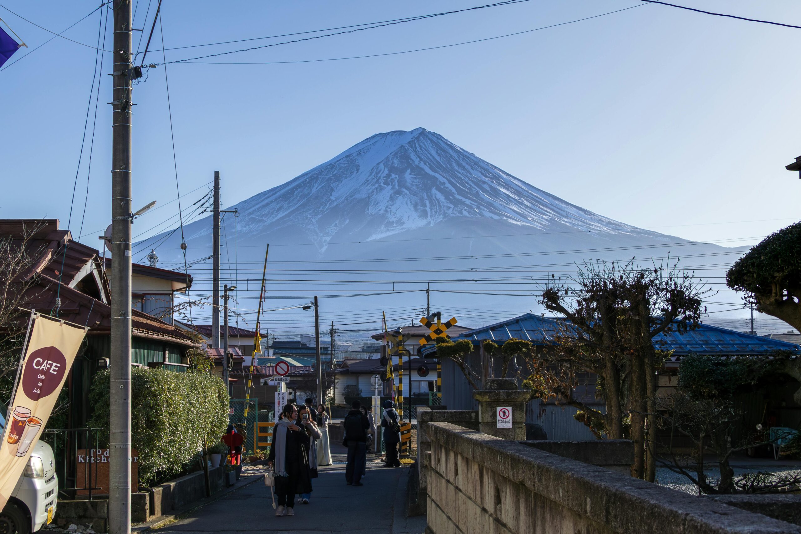 Discover the majestic sight of Mount Fuji from the streets of Fujiyoshida, Japan.