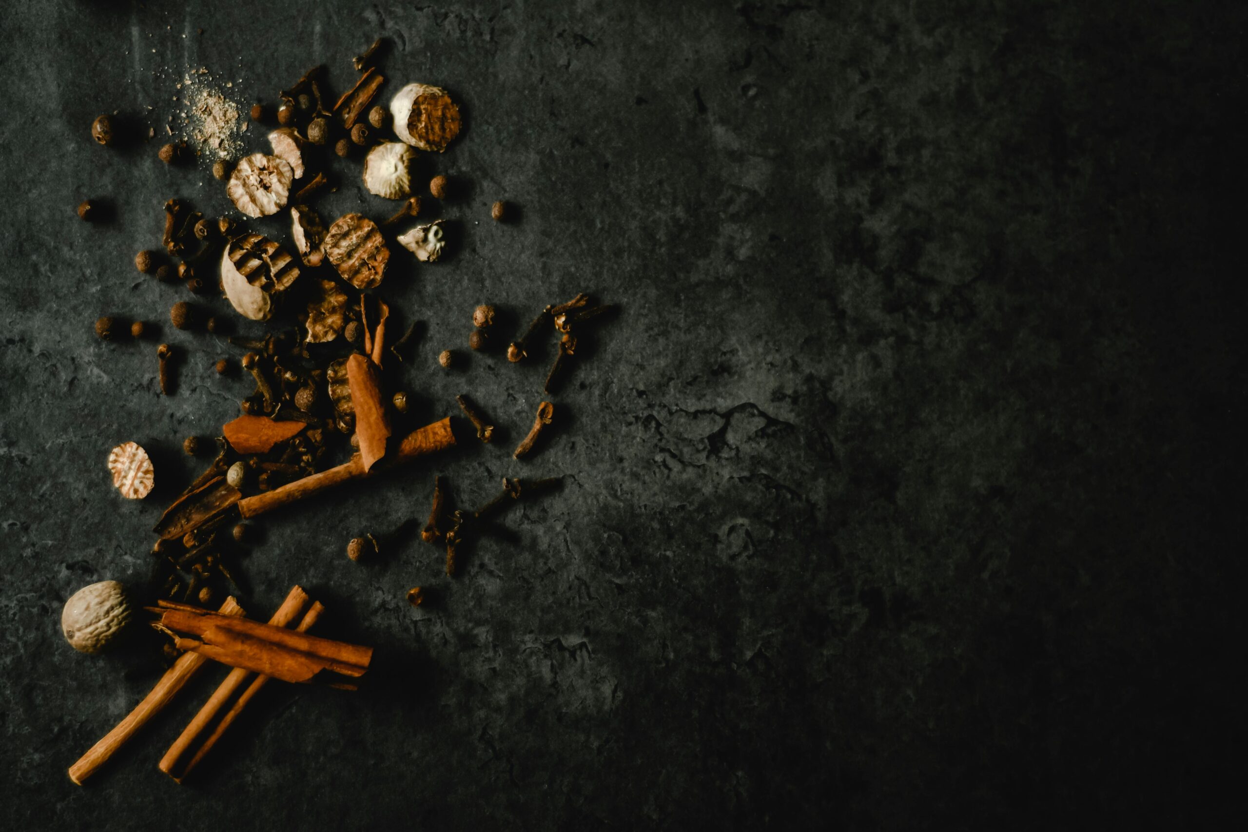 Eerie abandoned warehouse with a solitary chair illuminated by sunlight, evoking mystery.