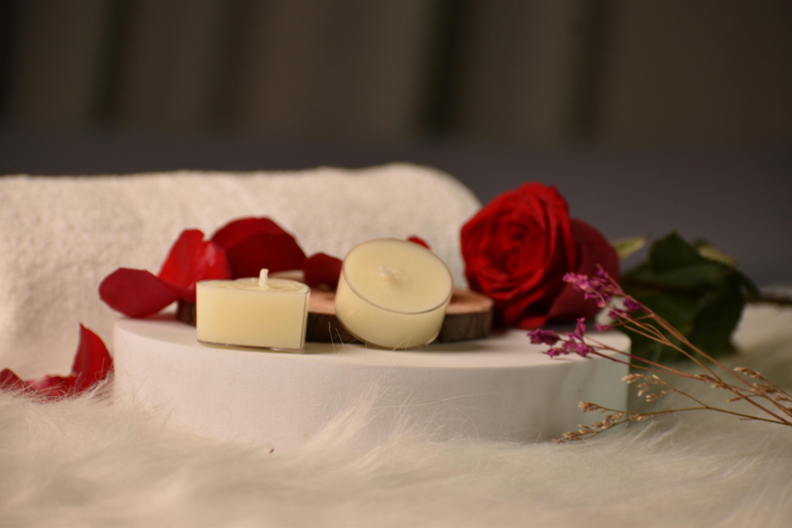 Warm and festive winter scene with burning candles, gingerbread cookies, and cozy holiday decorations.